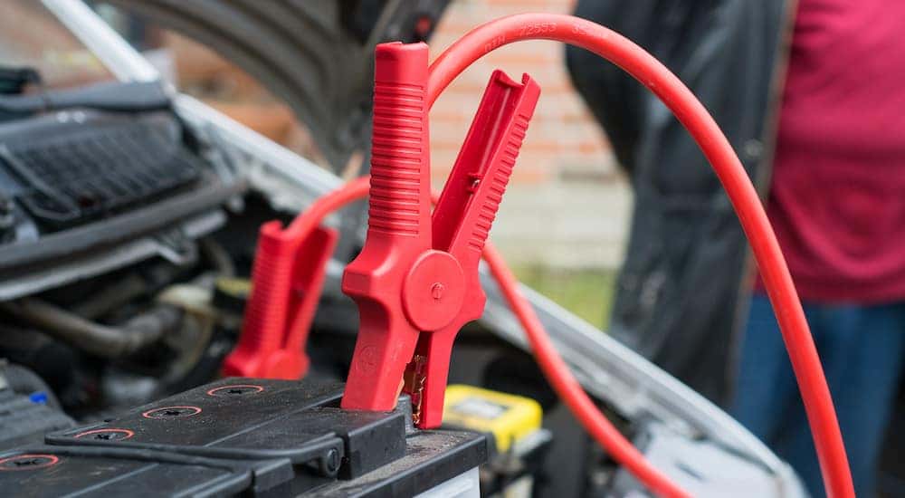 jumper cables charging car battery