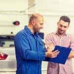 Technician explaining a Mazda recall