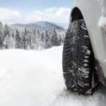 Car driving in the snow with Mazda service prep