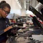 Technician working on a Mazda recall