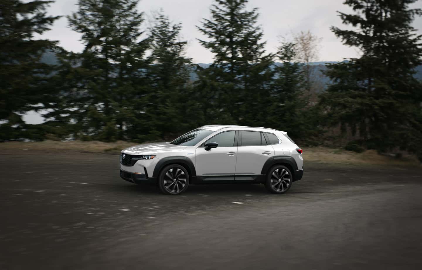 Mazda SUVs driving at wintertime