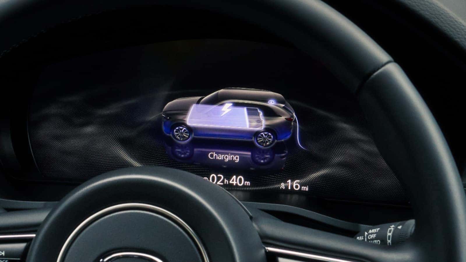 The dashboard of the 2026 Mazda CX-90 PHEV displaying charging info