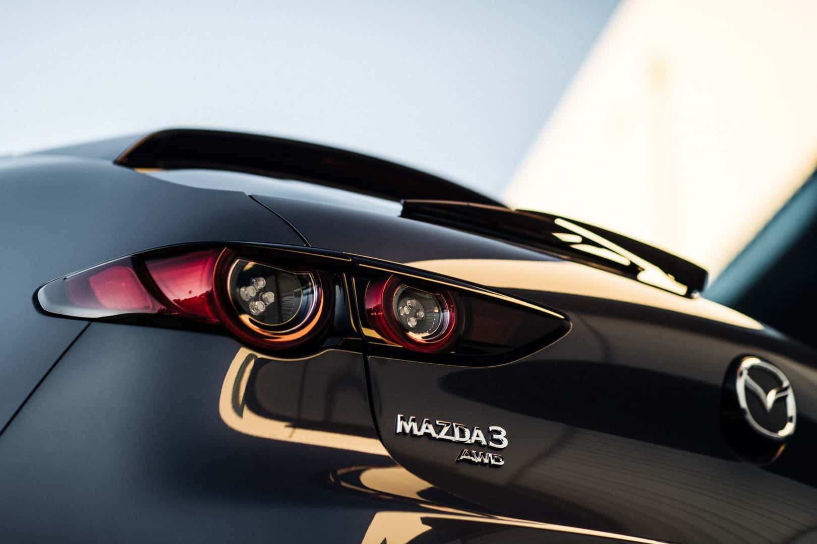 Mazda logo on the rear end of a car