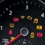 Dashboard of illuminated lights including the check engine light