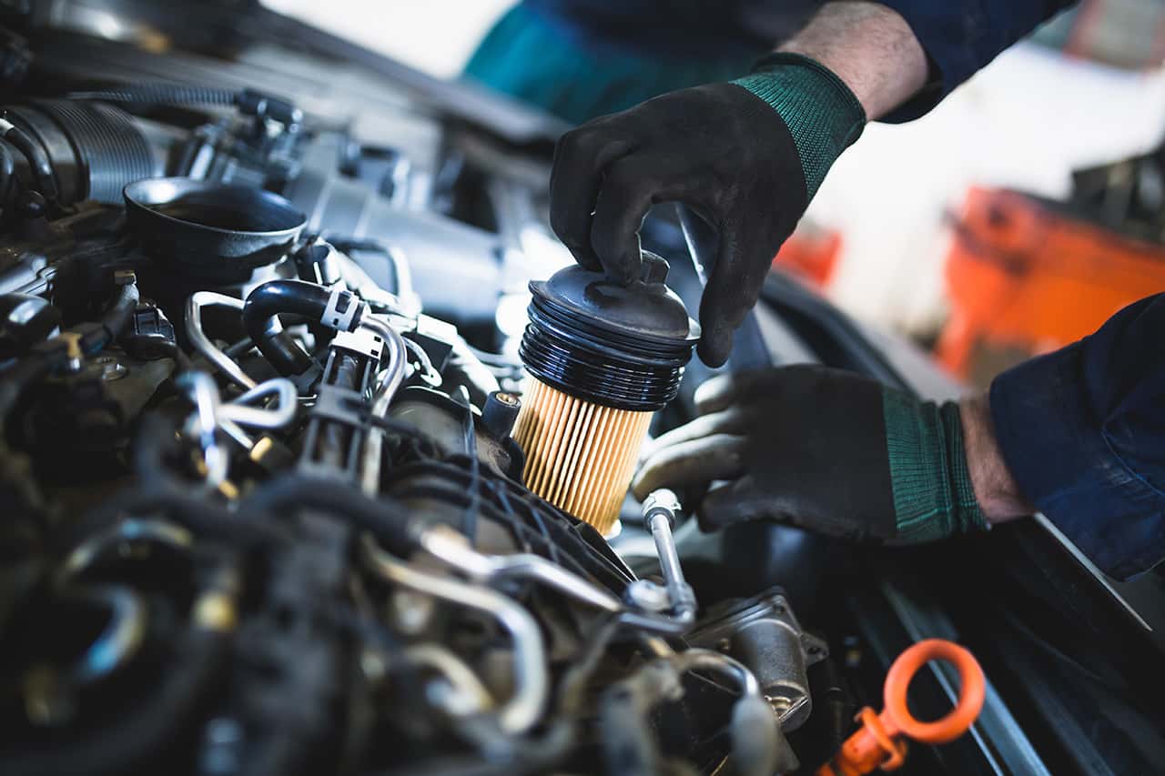 Replacing oil filter to improve Mazda fuel efficiency