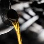 Pouring oil for a Mazda oil change