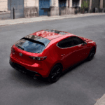 Rearview of a Mazda3 Hatchback on the road