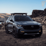 The Mazda CX-50 driving on rough terrain