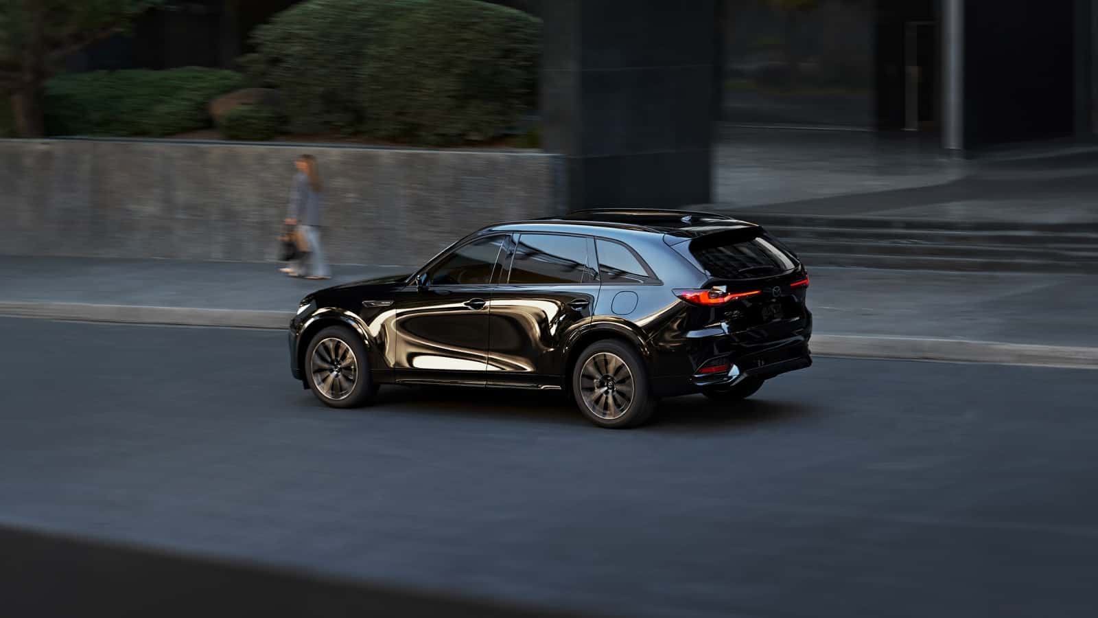 Mazda lease vehicle parked in a city