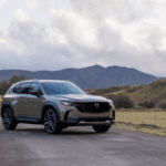 A Mazda crossover parked on the road